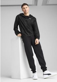 Puma - Męska Wiatrówka o standardowym kroju Essentials PUMA Black. Kolor: czarny. Materiał: guma. Wzór: nadruk