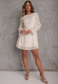 Renee - Beżowa Sukienka Vices Ozdobiona Transparentnymi Rękawami i Kropkami Celziva. Okazja: na co dzień. Kolor: beżowy. Materiał: koronka. Wzór: aplikacja, kropki. Styl: casual, elegancki #8