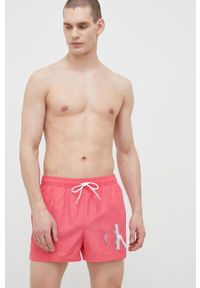Calvin Klein szorty kąpielowe kolor różowy. Kolor: różowy. Materiał: tkanina, poliester, materiał. Wzór: nadruk