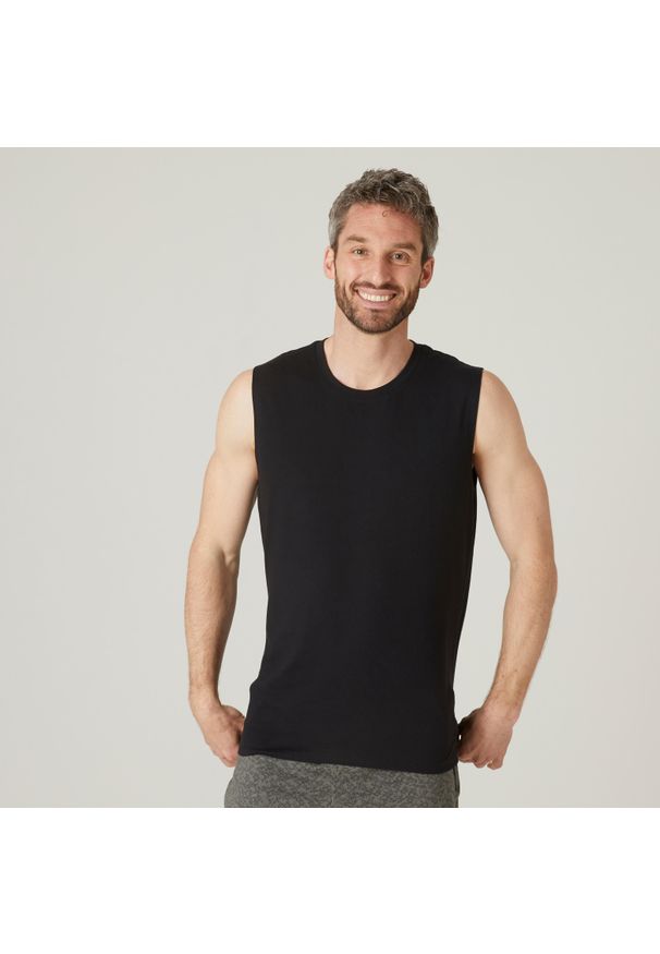 DOMYOS - Koszulka bez rękawów męska Nyamba Gym & Pilates 500 regular. Kolor: czarny. Materiał: elastan, poliester, materiał, bawełna. Długość rękawa: bez rękawów