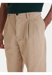 C.P. Company Spodnie materiałowe 20CMPA136A110458G Beżowy Loose Fit. Kolor: beżowy. Materiał: bawełna #2