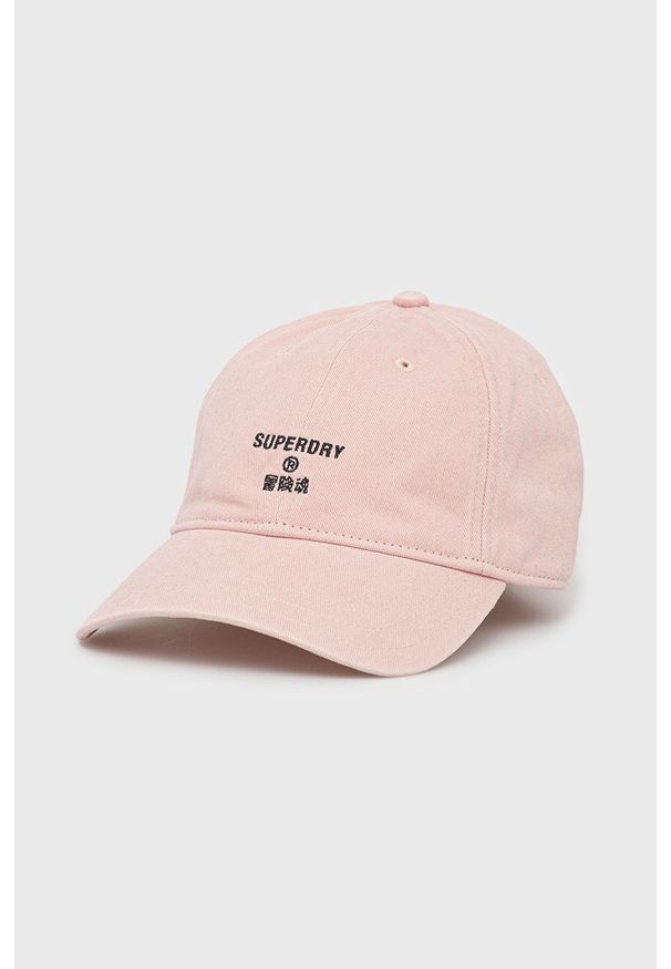 Superdry czapka bawełniana kolor różowy z aplikacją. Kolor: różowy. Materiał: bawełna. Wzór: aplikacja