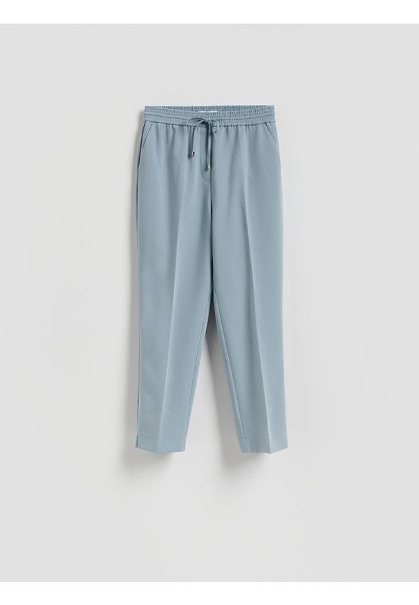 Reserved - Spodnie z kantem - jasnoniebieski. Kolor: niebieski. Materiał: tkanina, wiskoza