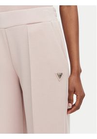 Guess Spodnie dresowe V6YB18 K4315 Różowy jasny Regular Fit. Kolor: różowy. Materiał: syntetyk #2