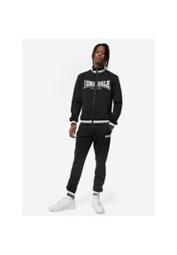 Dres o klasycznym kroju Lonsdale Poolewe. Kolor: wielokolorowy, biały, czarny. Materiał: dresówka #1