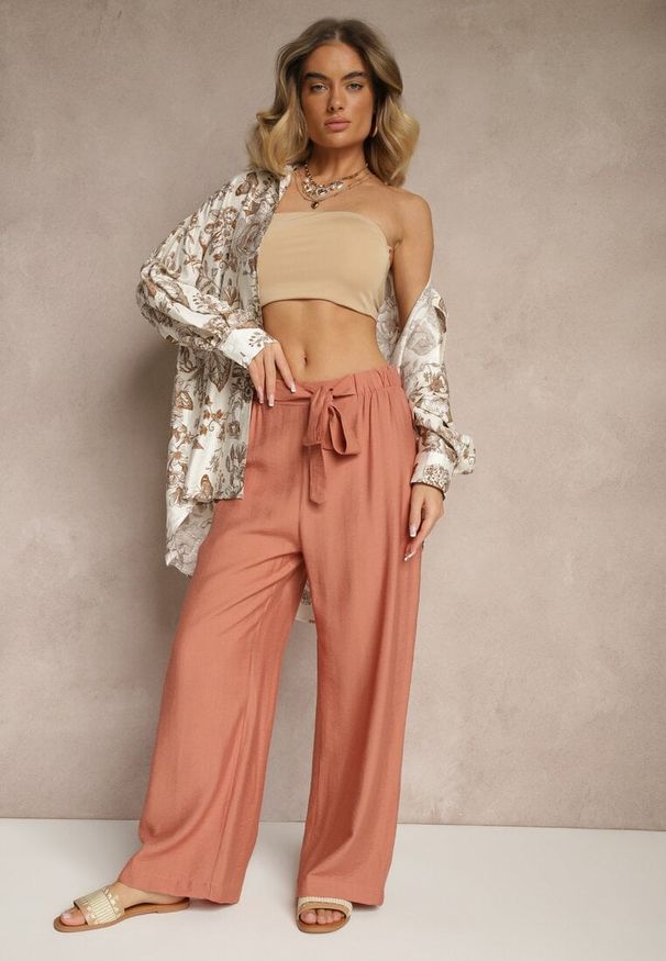 Renee - Pomarańczowe Spodnie z Wiskozy o Szerokim Kroju z Kokardą Ellioria. Okazja: na co dzień, na spacer. Kolor: pomarańczowy. Materiał: wiskoza. Styl: elegancki, casual