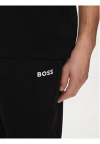 BOSS - Boss Spodnie dresowe Heritage 50515184 Czarny Regular Fit. Kolor: czarny. Materiał: bawełna