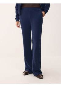 Reserved - Spodnie z modalem - granatowy. Kolor: niebieski. Materiał: dzianina #1