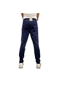 Puma - Spodnie Do Joggingu Męskie Logo. Kolor: niebieski. Materiał: dresówka. Sport: bieganie #2