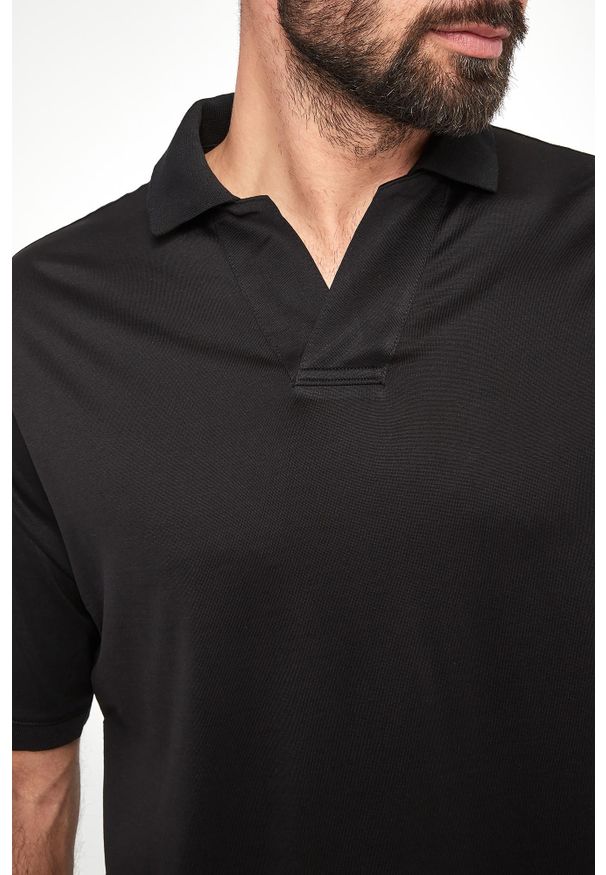 Emporio Armani - Polo męskie EMPORIO ARMANI. Typ kołnierza: polo