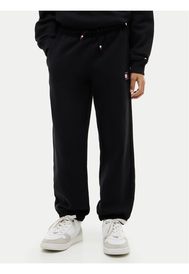 TOMMY HILFIGER - Tommy Hilfiger Spodnie dresowe KS0KS00715 S Czarny Regular Fit. Kolor: czarny. Materiał: bawełna