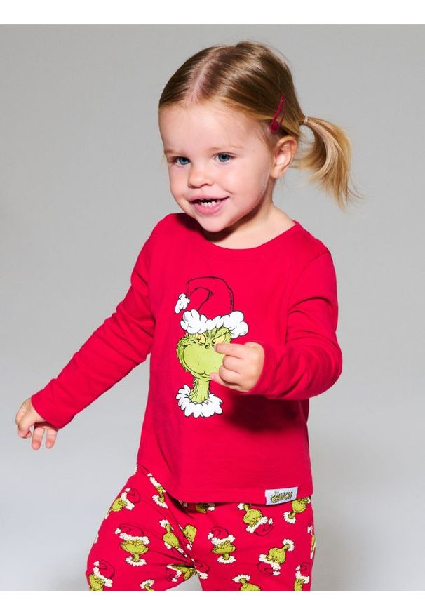 Sinsay - Bawełniana piżama dwuczęściowa z nadrukiem Grinch - czerwony. Kolor: czerwony. Materiał: bawełna. Wzór: nadruk