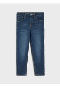 Sinsay - Spodnie jeansowe slim fit - granatowy. Kolor: niebieski