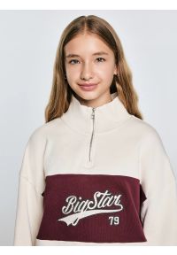 Big-Star - Bluza dziewczęca z krótkim zamkiem kremowa Rossalia 103. Okazja: na uczelnię, na spacer, na co dzień. Kolor: biały. Materiał: dresówka, dzianina. Długość: krótkie. Wzór: ze splotem, haft, aplikacja. Styl: casual #7