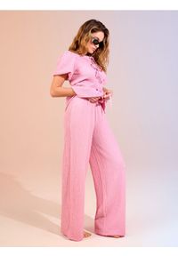 Sinsay - Spodnie wide leg - różowy. Kolor: różowy