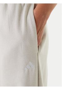 Adidas - adidas Spodnie dresowe Essentials Small Logo Feel Cozy JC5922 Beżowy Regular Fit. Kolor: beżowy. Materiał: syntetyk, bawełna #4