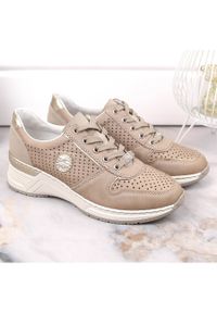 Buty damskie sportowe na koturnie ażurowe beżowe Rieker N4346-60 beżowy. Kolor: beżowy. Wzór: ażurowy. Obcas: na koturnie #3