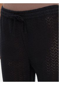 Roxy Spodnie materiałowe ERJX603437 Czarny Regular Fit. Kolor: czarny. Materiał: bawełna
