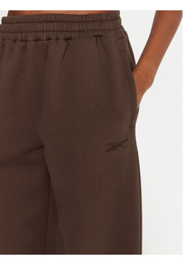 Reebok Spodnie dresowe Reebok X Ewa Chodakowska RK25304CCW Brązowy Regular Fit. Kolor: brązowy. Materiał: bawełna, syntetyk
