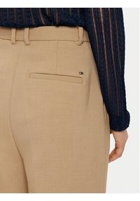 TOMMY HILFIGER - Tommy Hilfiger Spodnie materiałowe WW0WW43875 Beżowy Regular Fit. Kolor: beżowy. Materiał: syntetyk