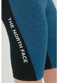 The North Face szorty sportowe Mountain Athletics damskie z nadrukiem medium waist. Kolor: niebieski. Materiał: skóra, materiał, włókno. Wzór: nadruk. Styl: sportowy #4