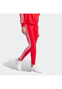 Adidas - Legginsy fitness damskie ADIDAS. Stan: podwyższony. Kolor: czerwony. Materiał: elastan, bawełna, materiał. Sport: fitness