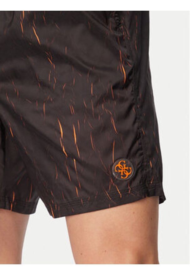 Guess Szorty kąpielowe F6GT18 WN352 Czarny Regular Fit. Kolor: czarny. Materiał: syntetyk