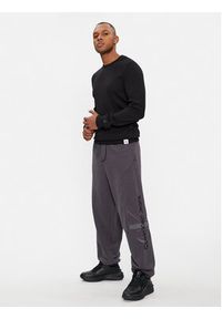 Calvin Klein Jeans Spodnie dresowe Monologo J30J324953 Szary Relaxed Fit. Kolor: szary. Materiał: bawełna