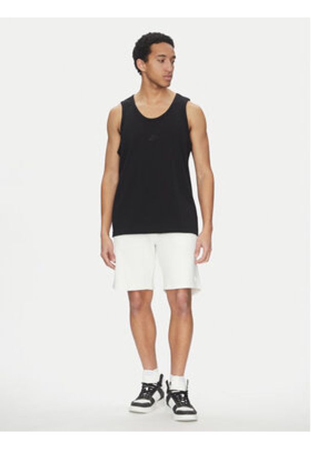 Nike Tank top FD1290 010 Czarny Regular Fit. Kolor: czarny. Materiał: bawełna