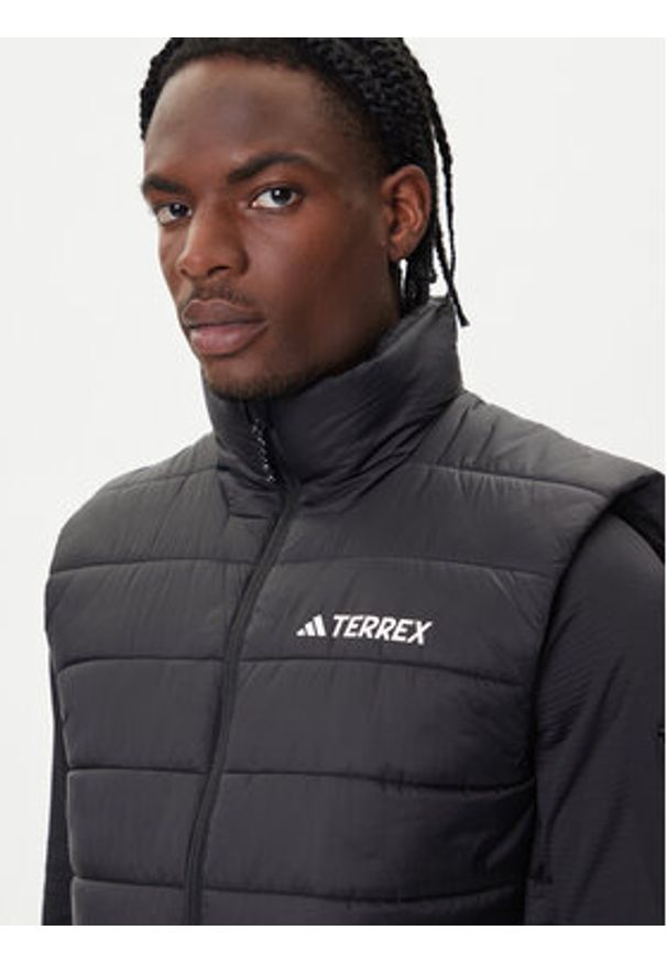 Adidas - adidas Kamizelka Terrex Multi Essentials Climawarm KA9740 Czarny Regular Fit. Kolor: czarny. Materiał: syntetyk. Technologia: ClimaWarm (Adidas)