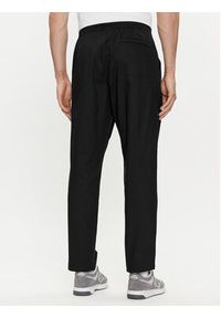 New Balance Spodnie dresowe MP41575 Czarny Regular Fit. Kolor: czarny. Materiał: bawełna #4