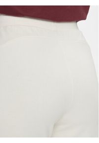 Puma Spodnie dresowe Ess+ Embroidery 670007 Écru Regular Fit. Materiał: syntetyk