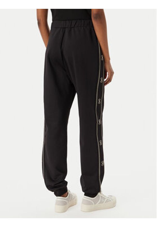 Guess Spodnie dresowe V5BB23 KCX22 Czarny Wide Leg. Kolor: czarny. Materiał: syntetyk