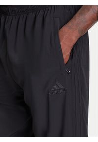 Adidas - adidas Spodnie dresowe Teamgeist adicolor KA0596 Czarny Loose Fit. Kolor: czarny. Materiał: syntetyk #3
