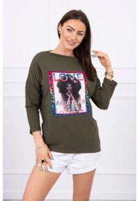 Inny - Bluzka z grafiką American Girl khaki S/M - L/XL L/XL. Okazja: do pracy, na co dzień. Kolor: brązowy. Materiał: materiał, bawełna, elastan. Wzór: kolorowy. Styl: casual