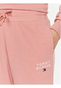 TOMMY HILFIGER - Tommy Hilfiger Spodnie dresowe UW0UW04522 Różowy Regular Fit. Kolor: różowy. Materiał: bawełna