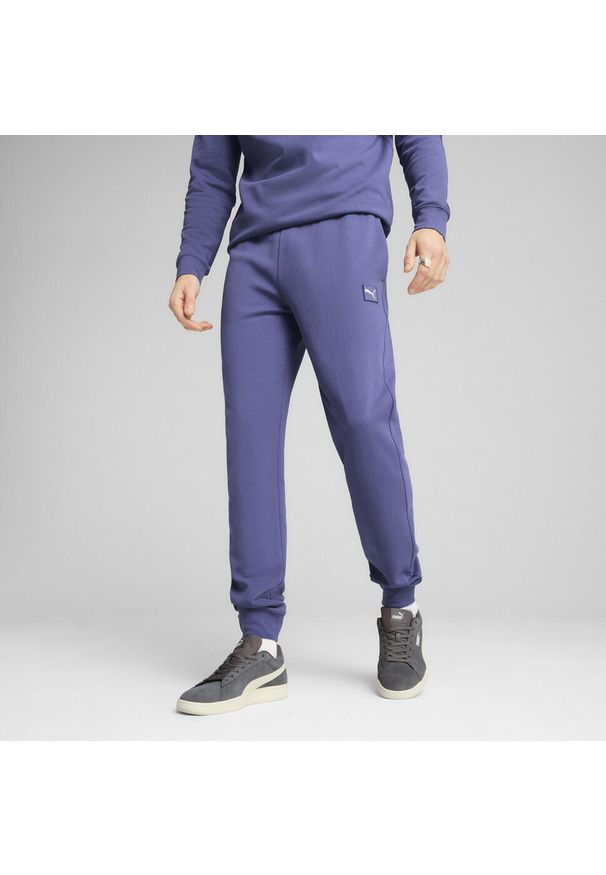 Puma - Męskie spodnie Essentials Elevated PUMA Blue Crystal. Kolor: niebieski. Sport: fitness