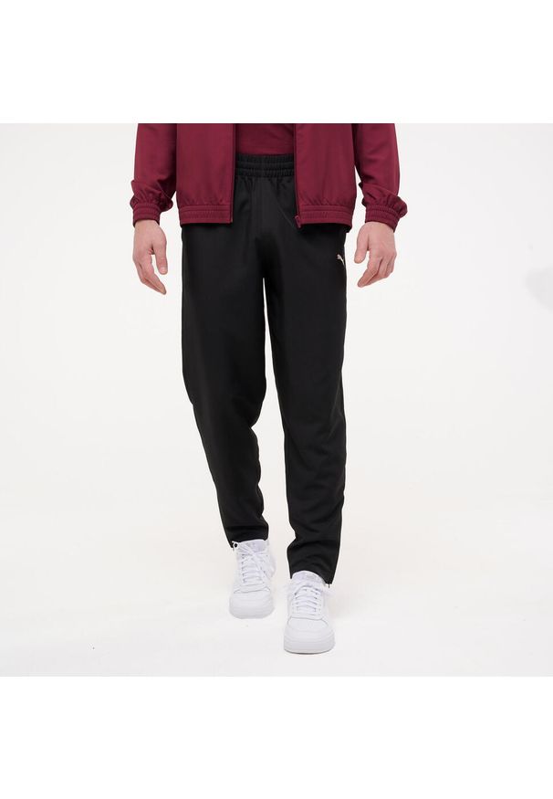 Spodnie dresowe męskie Puma Woven Gym & Pilates. Kolor: czarny. Materiał: dresówka. Sport: joga i pilates