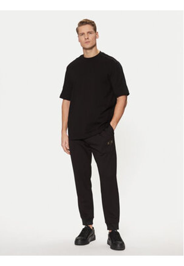Armani Exchange Spodnie dresowe XM000333 AF12269 UC001 Czarny Regular Fit. Kolor: czarny. Materiał: syntetyk