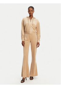 Juicy Couture Spodnie dresowe Christine JCWBJ125304 Beżowy Flared Leg. Kolor: beżowy. Materiał: syntetyk