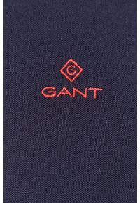 GANT - Gant Polo męskie kolor granatowy gładki. Okazja: na co dzień. Typ kołnierza: polo. Kolor: niebieski. Materiał: dzianina. Długość: krótkie. Wzór: gładki. Styl: casual