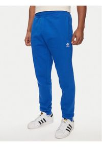 Adidas - adidas Spodnie dresowe Trefoil Essentials IR7806 Niebieski Regular Fit. Kolor: niebieski. Materiał: bawełna