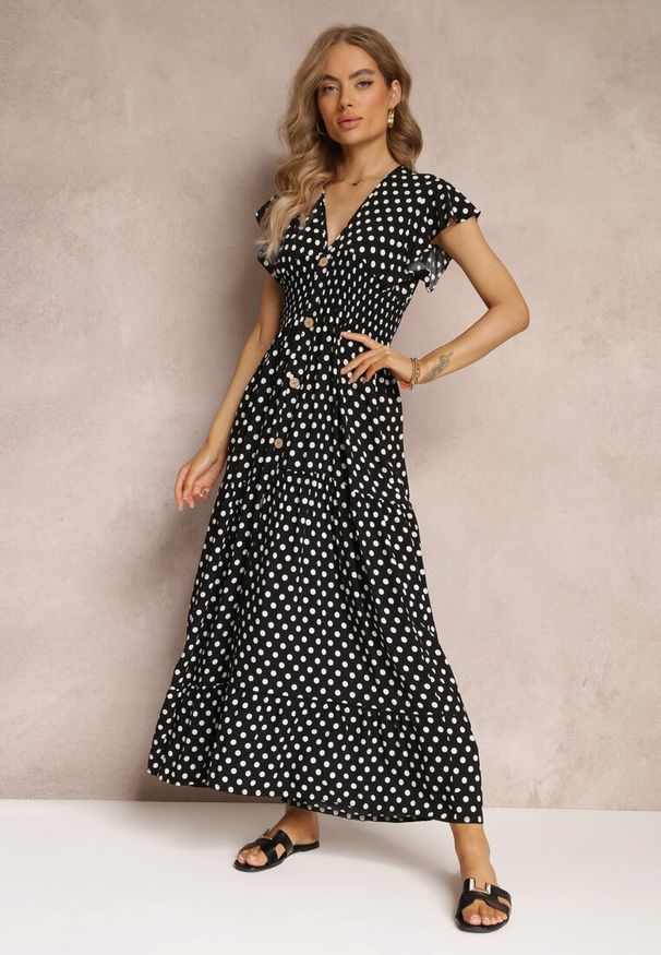 Renee - Czarna Rozkloszowana Sukienka Maxi w Kropki z Gumką w Talii Janey. Okazja: na co dzień, na imprezę. Kolor: czarny. Wzór: kropki. Styl: casual. Długość: maxi