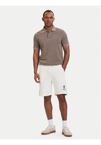 TOMMY HILFIGER - Tommy Hilfiger Szorty sportowe Crest Embroidery MW0MW42878 Beżowy jasny Relaxed Fit. Kolor: beżowy. Materiał: bawełna. Styl: sportowy #5