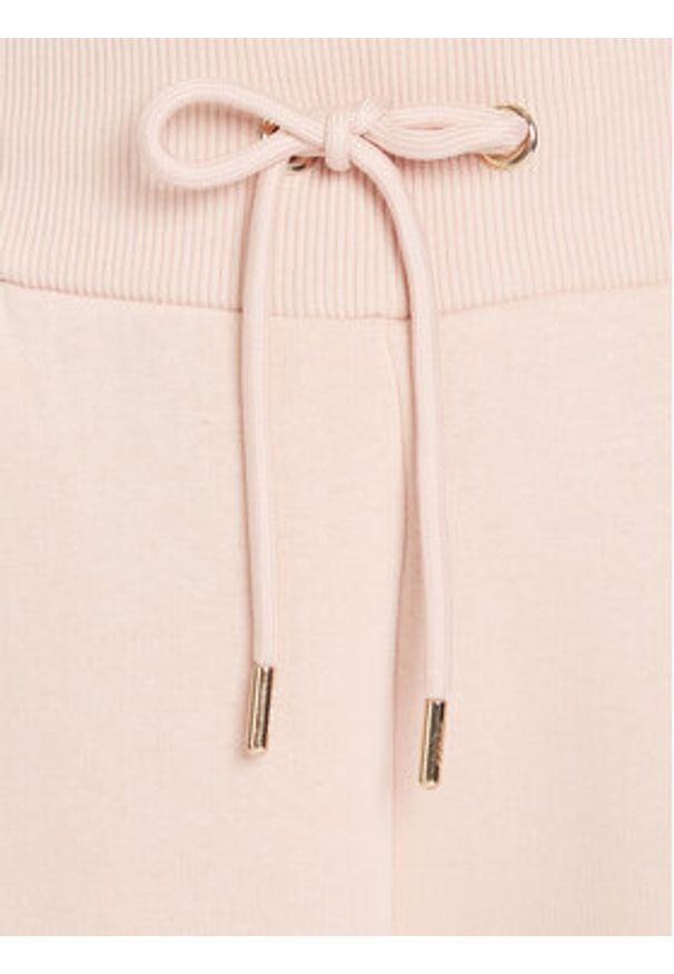 Guess Spodnie dresowe V5BB10 KB681 Różowy Regular Fit. Kolor: różowy. Materiał: syntetyk