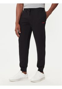 Hugo - HUGO Spodnie dresowe Austin 50532012 Czarny Regular Fit. Kolor: czarny. Materiał: bawełna #1