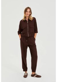 MOODO - Gładkie spodnie brązowe. Kolor: brązowy. Materiał: wiskoza, len. Wzór: gładki #1