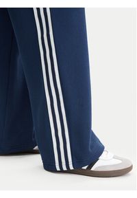 Adidas - adidas Spodnie dresowe adicolor Firebird JV7524 Granatowy Regular Fit. Kolor: niebieski. Materiał: syntetyk #4