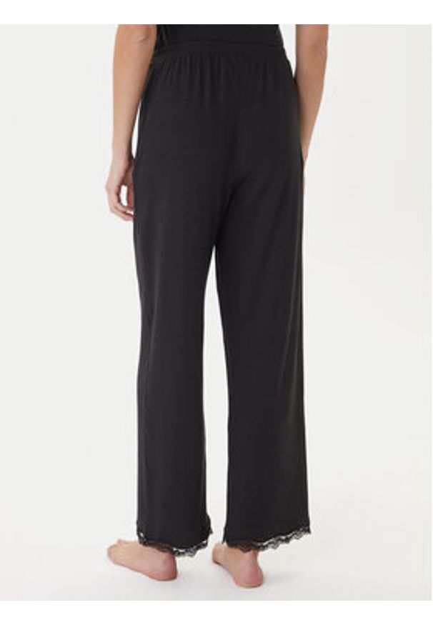 TOMMY HILFIGER - Tommy Hilfiger Spodnie piżamowe UW0UW06074 Czarny Regular Fit. Kolor: czarny. Materiał: bawełna