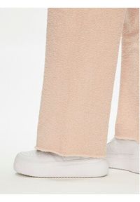 Ugg Spodnie damskie Terri 1121077 Beżowy Relaxed Fit. Kolor: beżowy. Materiał: syntetyk